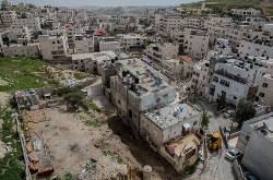 Palestinians forced to demolish own homes