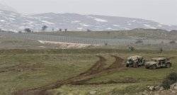 Israel fires back after Syria rockets hit Golan Heights