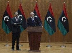 ICC agrees to let Libya try Gaddafi