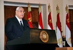 Egypt president sets date for referendum 