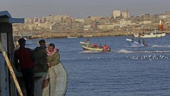 Palestinians bury fishermen killed by Israel