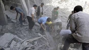 Barrel bombs fall on Syria’s Douma, killing 50