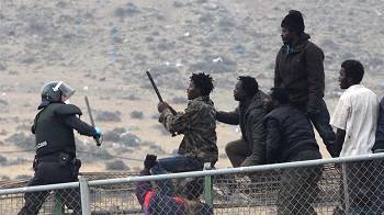 More than 1,000 migrants storm border at Spain