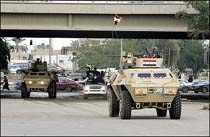 Ten Killed in Baghdad Convoy Ambush 