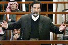 Saddam Forced to Courtroom