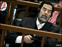 Saddam makes surprise showing