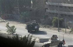 Three U.S. troops, two civilians killed in Baghdad