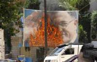 Hezbollah routs pro-government gunmen; controls Beirut