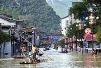 Southern China flooding kills 57, more rain ahead 