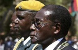 Mugabe swears in vice-presidents before talks 