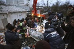 Ukraine blast flattens apartment block, kills 19