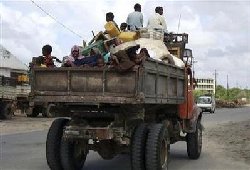 Thousands flee Mogadishu, death toll hits 113