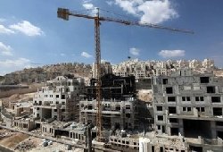 Israel rejects settlement halt 