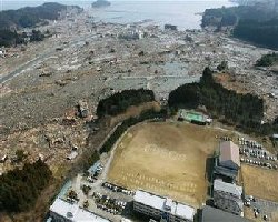 Blast strikes Japan plant; 2,000 bodies found on coast