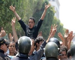 Tunisia declares curfew after renewed protests