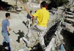 Palestinians Defy Curfew & Protest Security Post in Nablus