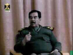 Saddam Vows to Defend Baghdad in Statement Read on TV