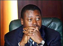 President of Togo Bows to Pressure for Election