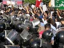 Protesters with Cairo Police